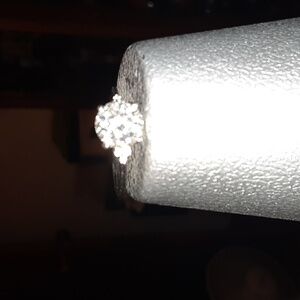 100 facets Moissanite ring platinum over sterling silver.  2 carats.  8 mm.